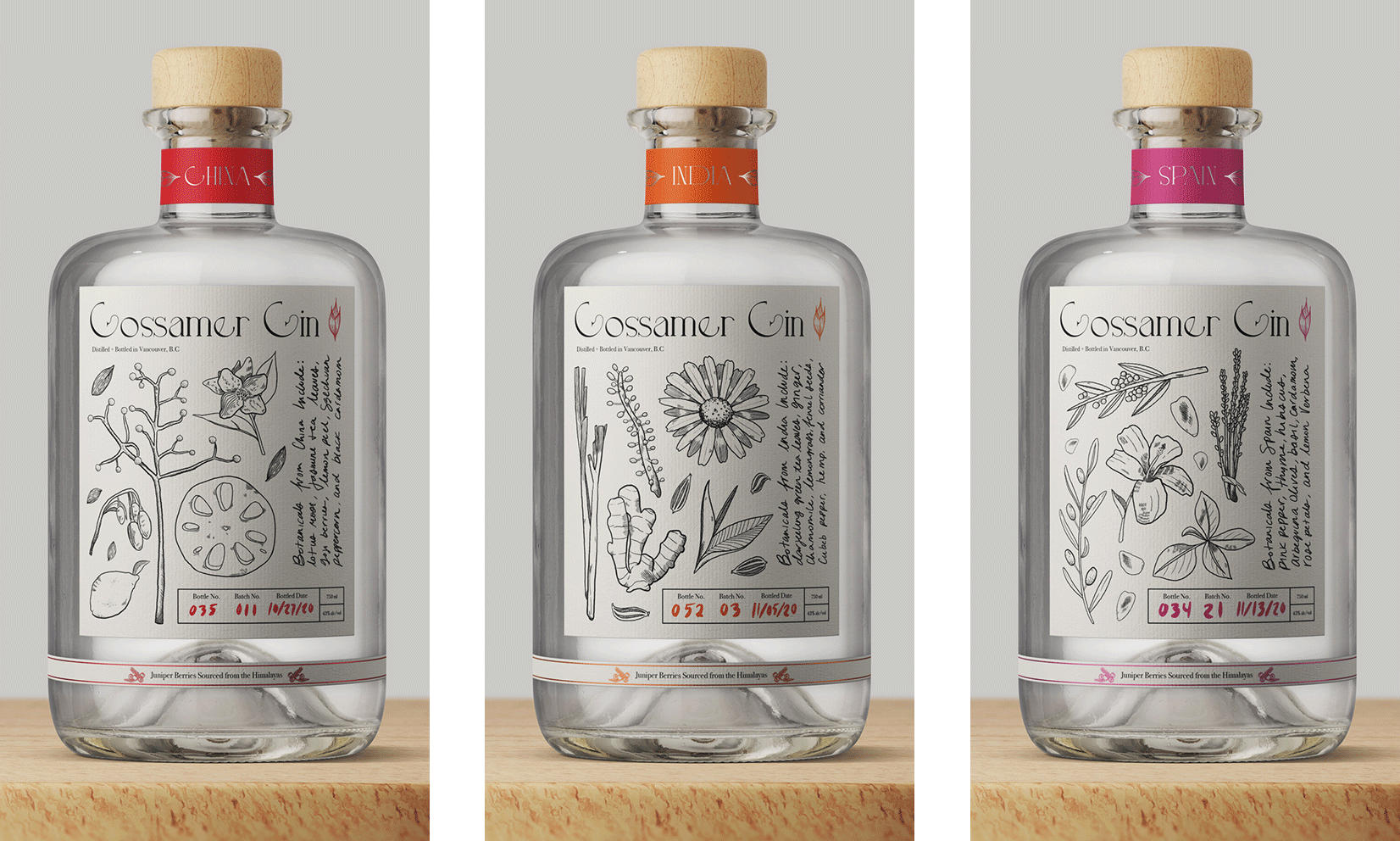 Three gin bottles side by side.
